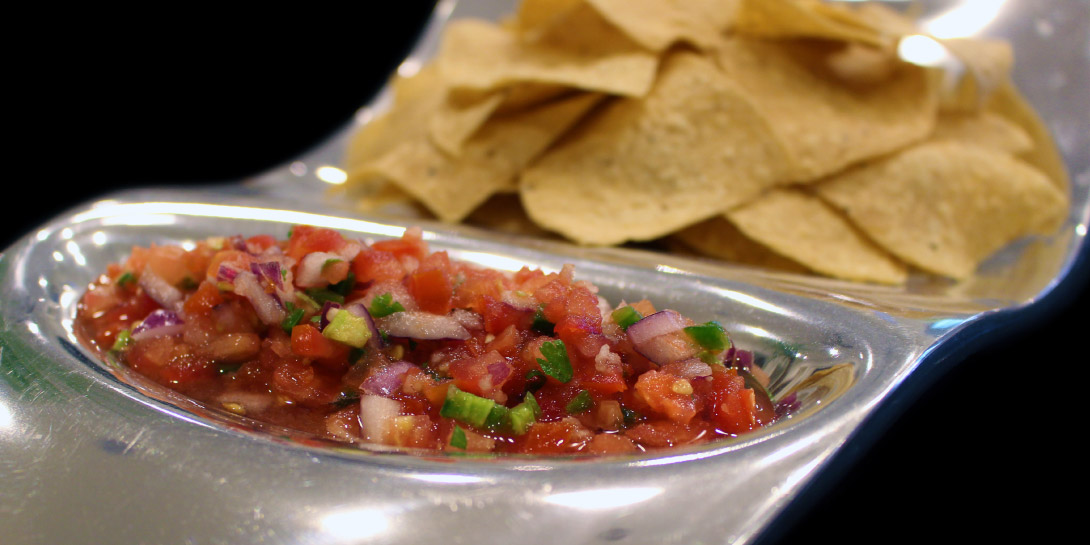Image of Elevated Vegan Mexican Salsa Fresca on a platter with chips.